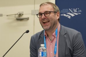 Close up of Pete Duncan speaking and laughing